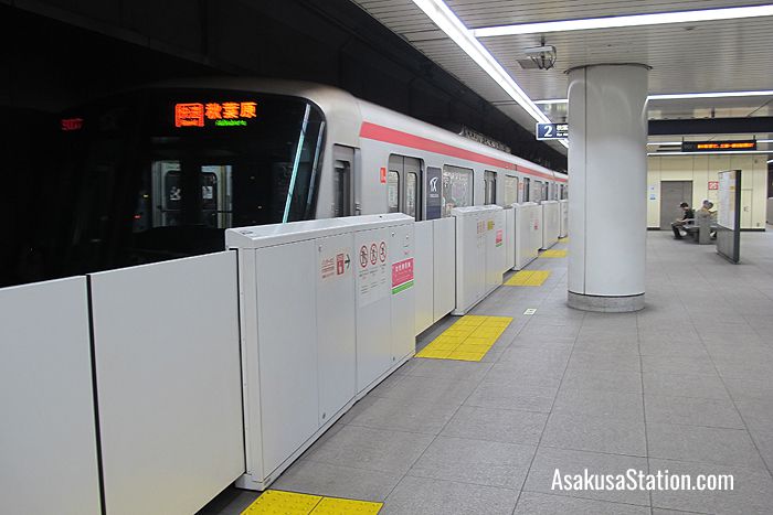 A train departing at Platform 2 TX Asakusa Station