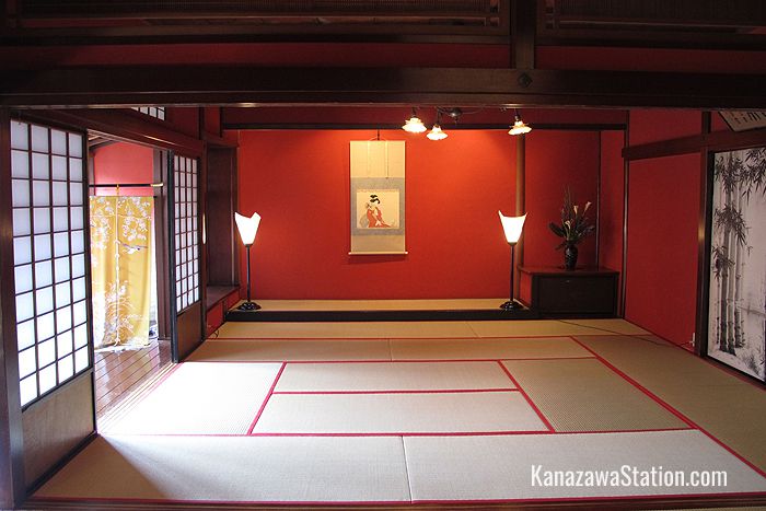 Lustrous red walls and elegant furnishings on the upper floor