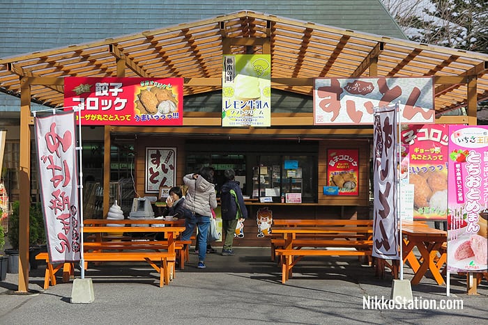 A shop selling gyoza croquettes, lemon ice cream, and suiton dumplings in soup