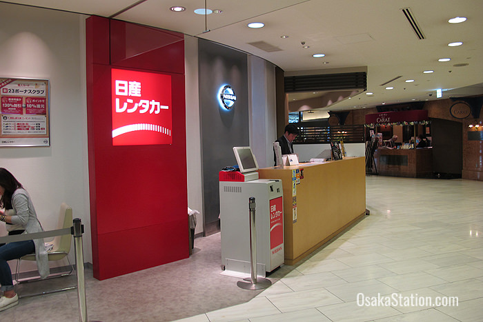 The desk for Nissan Rent-a-Car is south of Osaka Station on the 1st floor of the Umeda Maru Building