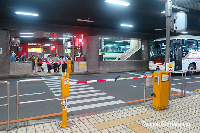A crossing between bus lanes