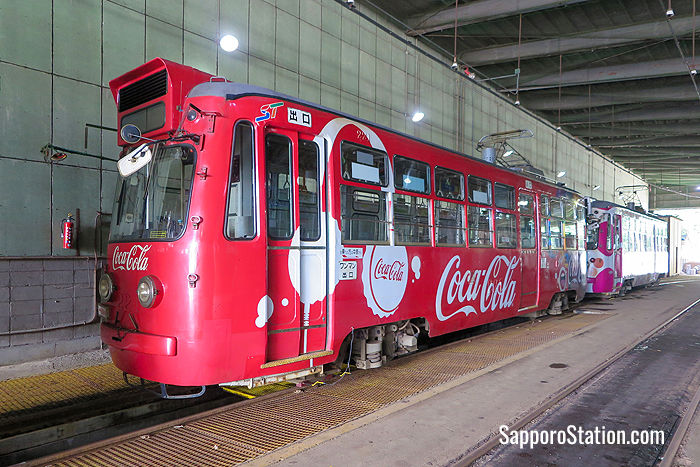 The standard color of Sapporo’s trams is green, but some have colorful advertising