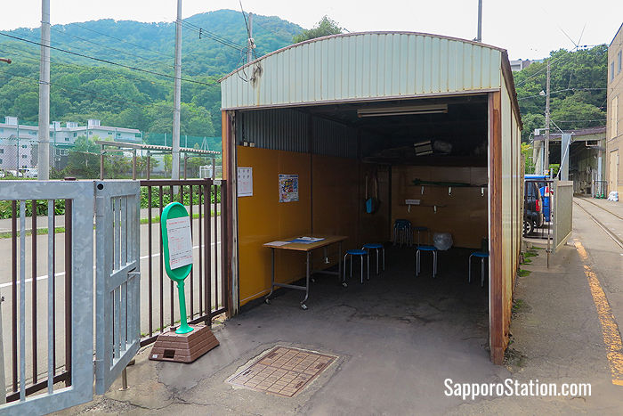 After arriving at the depot wait at this shelter for your guide