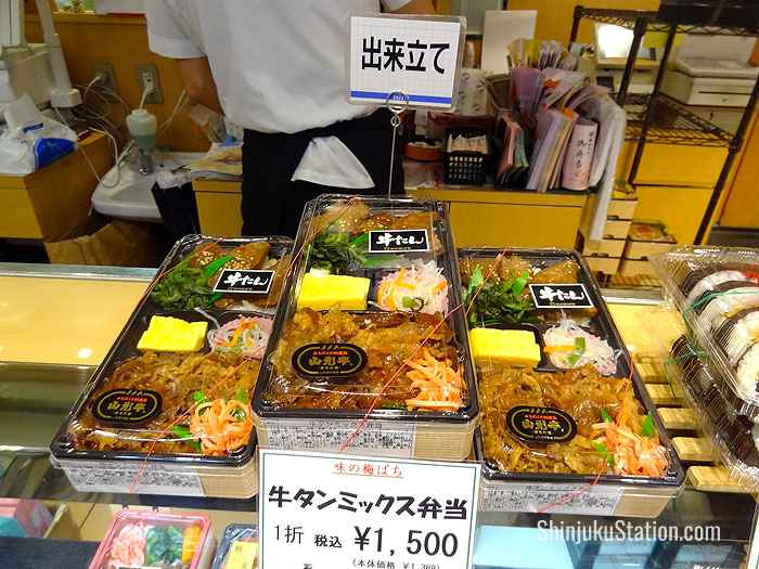 Freshly made beef tongue bento boxes on the food floor