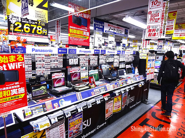 Yodobashi Camera’s interior is festooned with advertising and logos