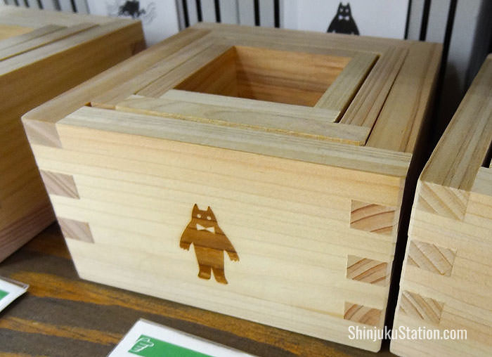 Nearby are traditional masu nested cypress boxes, which can be used for drinking sake or as storage containers