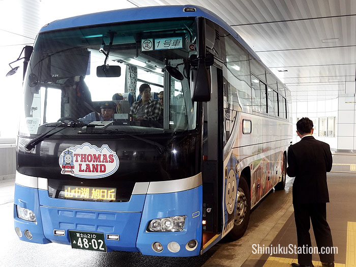 A bus bound for Lake Yamanaka near Mt. Fuji boards passengers at Basuta Shinjuku