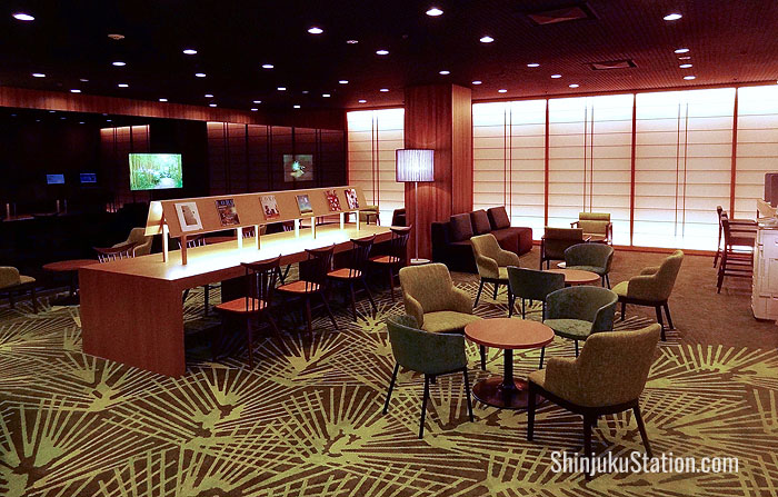 The retro-styled lounge has a magazine rack and traditional Daruma dolls and other traditional crafts on display