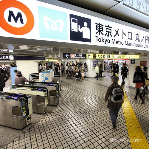 Color-coded red, M is the alphanumeric prefix for stations on the Marunouchi Line