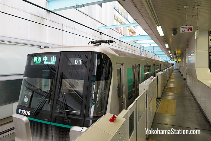 A Green Line train at Center-Minami Station. Platform screen doors are installed on all platforms to ensure passenger safety